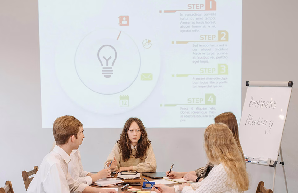 Business team reviewing a chart of steps